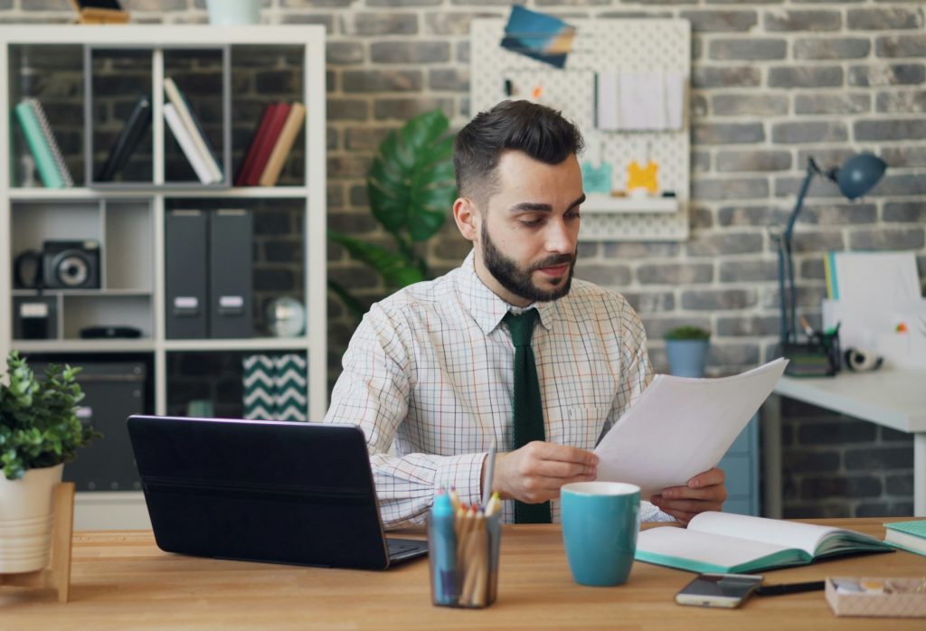 accountant reviewing tax and payroll